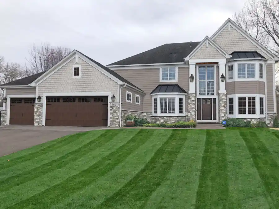 Two-story home after Jensen Remodel Design exterior rendering
