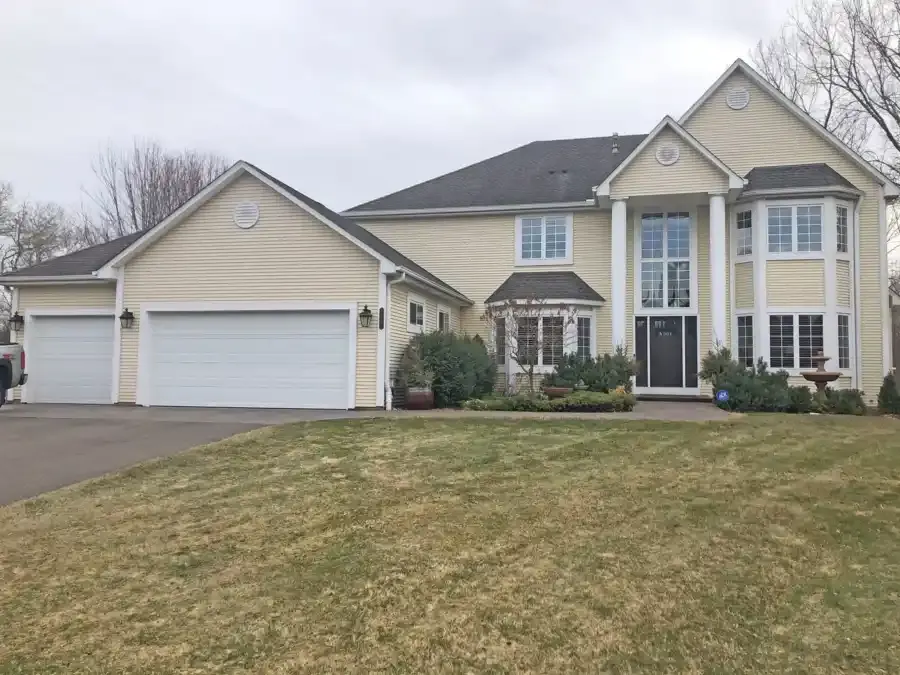 Two-story colonial before exterior redesign